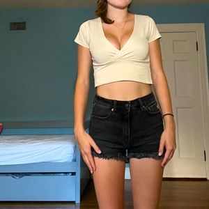 crossed cream cropped shirt